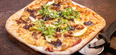 BBQ pulled pork, Cheddar, Mozzarella, caramelised onion, fresh apple and rocket served on a pizza plate