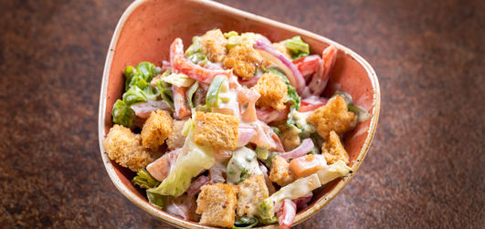 Mix crisp salad with  lettuce, red onion, beef tomato, Italian cheese, spring onion, red pepper, crispy croutons with honey mustard dressing